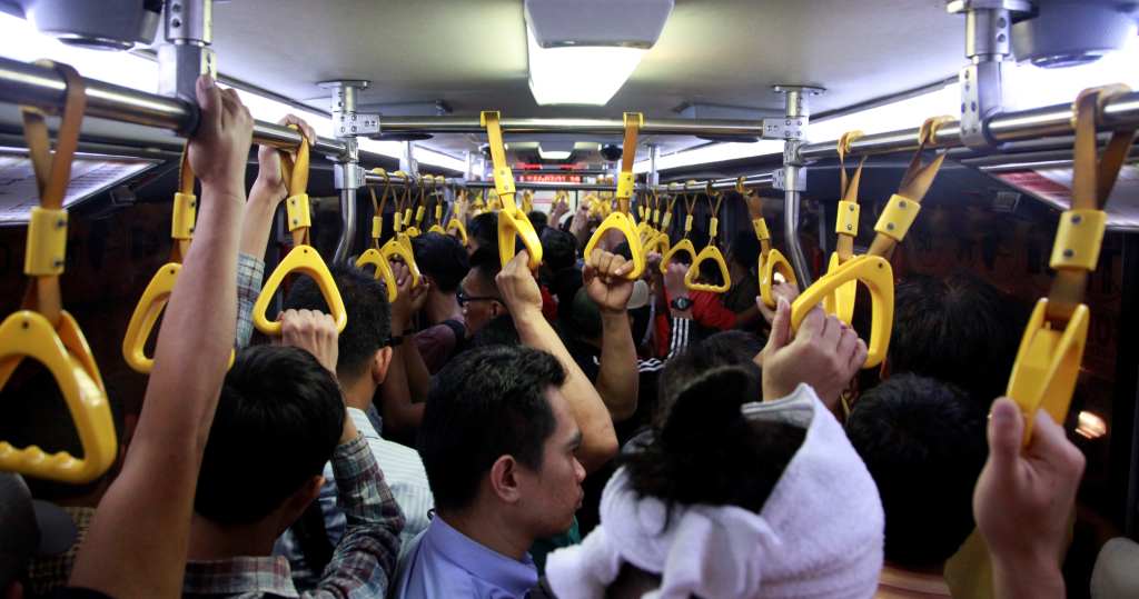 people packed in a bus